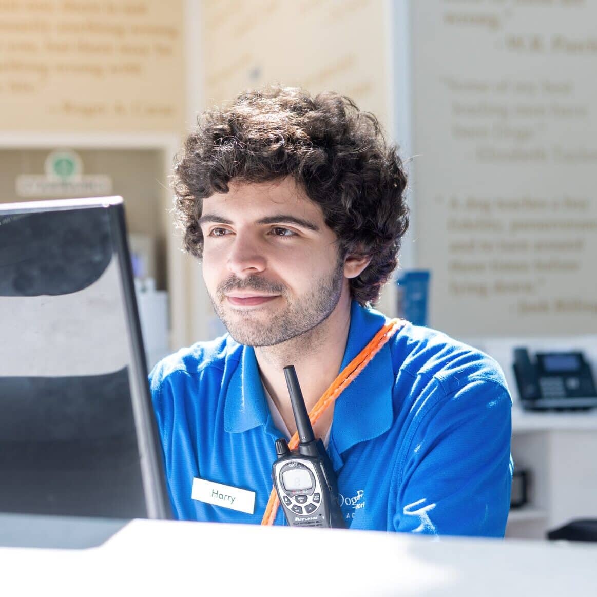 Staff member at front desk at DogBeach for Dog Boarding near Orlando, FL